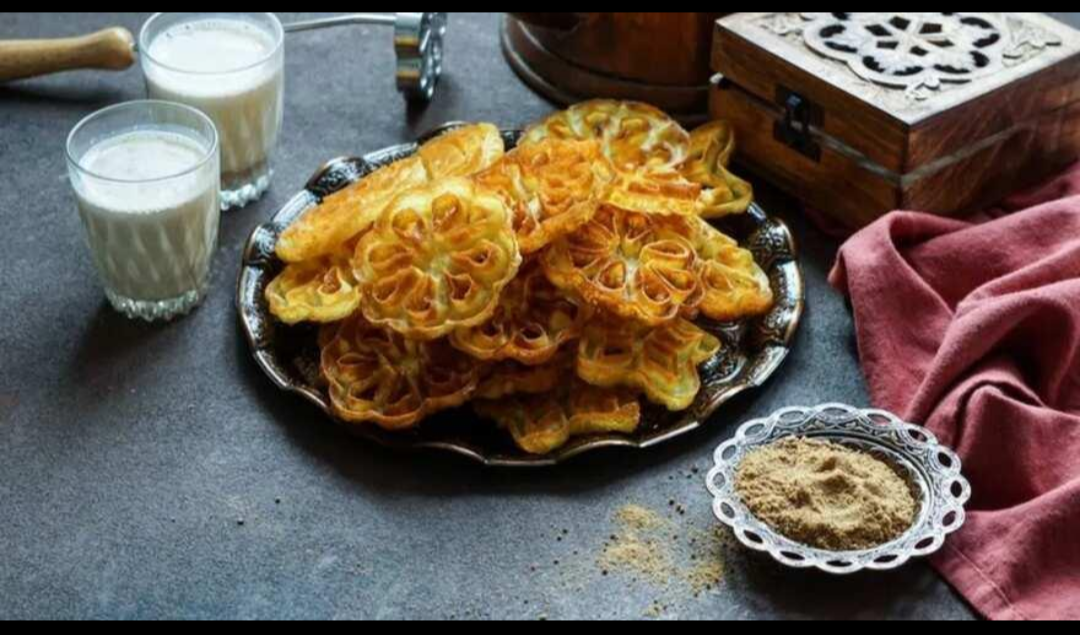 Appam with stew and achu murukku, festive favourites associated with CSI homes in South India.