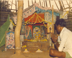 A person of mali tribe worshiping goddess