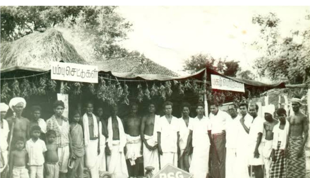 "Historic photograph of a village community gathering, showcasing social solidarity, cultural traditions, and everyday life in an earlier era."
