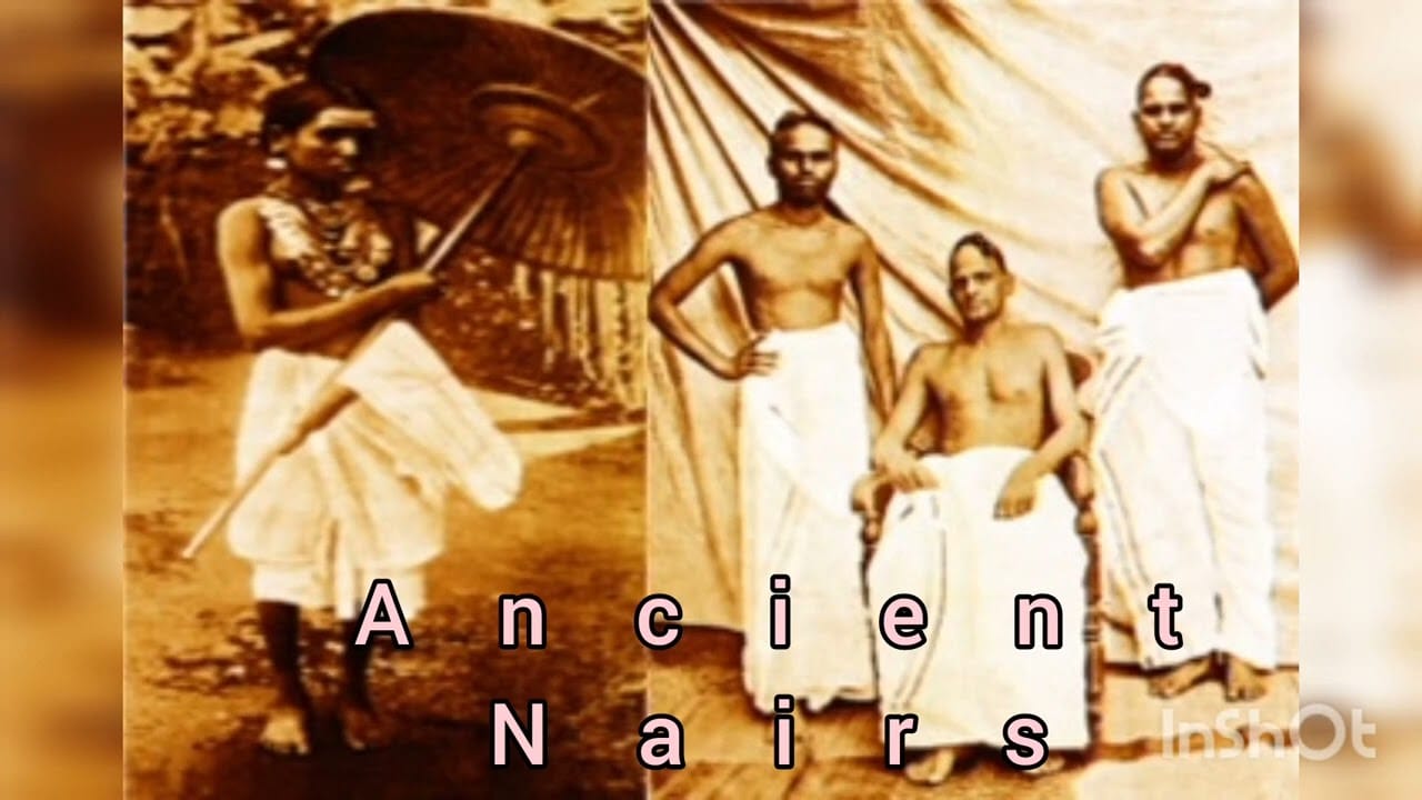 Sepia-toned historical photograph of Nair community members from Kerala. One man stands holding a ceremonial umbrella while three others pose in traditional white mundu attire, reflecting the dress, customs, and cultural identity of the Nair community in pre-modern Kerala.