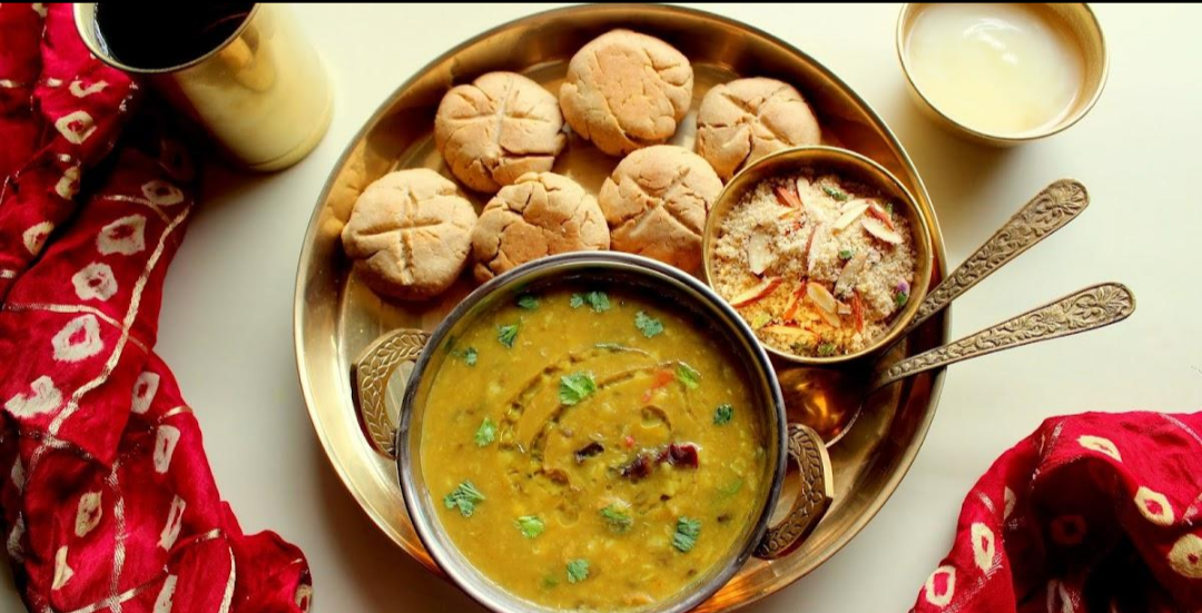 Dal baati churma, one of the characteristic dishes of the Mewari and wider Rajasthani culinary tradition.