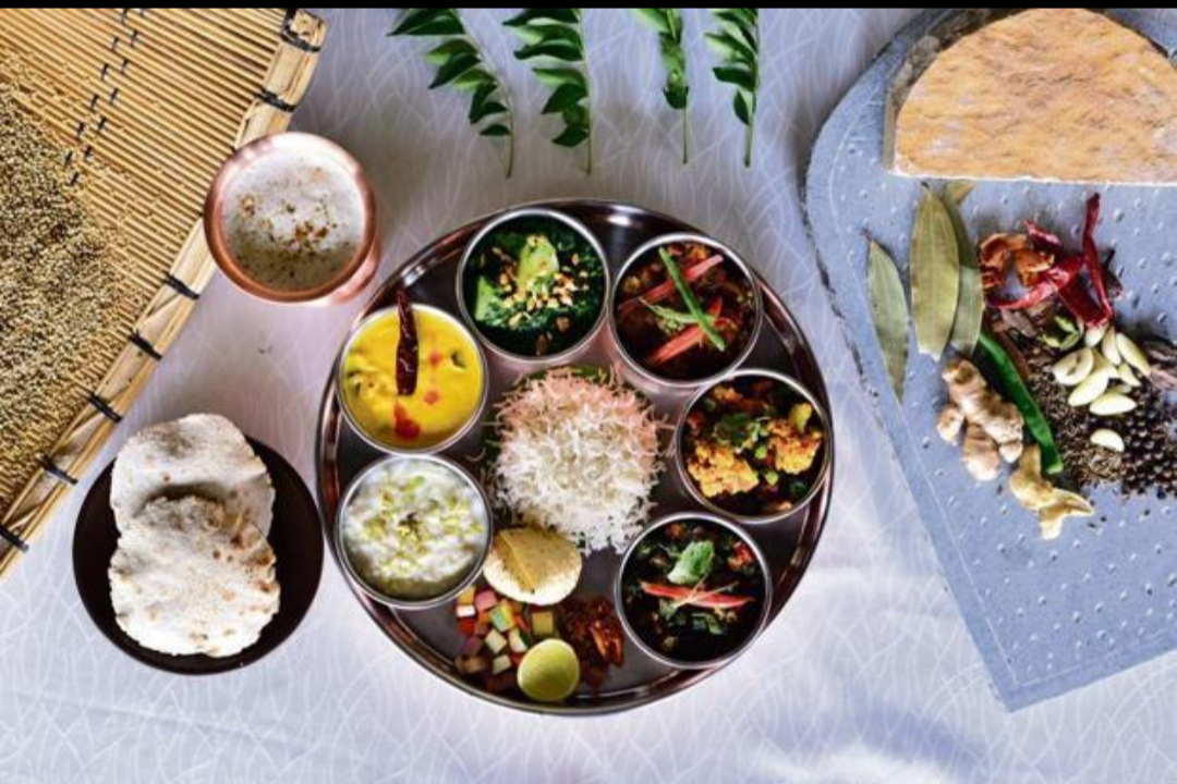 Haryanvi food including, bajra roti, khichdi, kadhi, lassi, butter, kachri and traditional sweets.