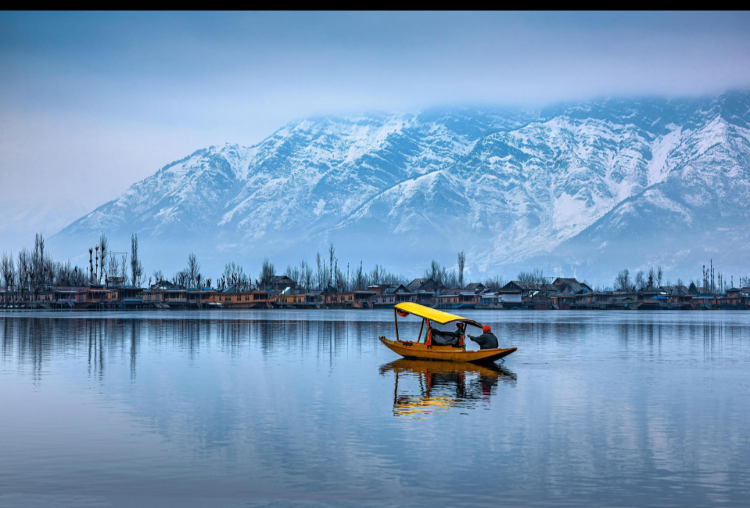Kashmir Valley — mountains, lakes and settlements shaping the cultural landscape of Jammu and Kashmir.