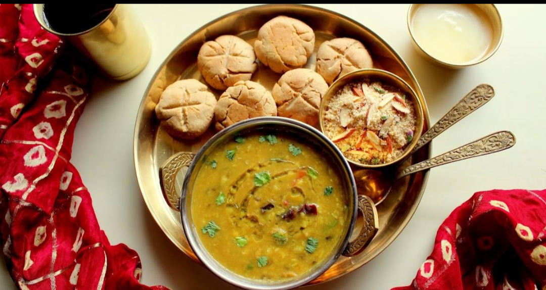 Parmar-associated cuisine dal baati churma, dal bafla, bhutte ka kees, gatte ki sabzi and ker sangri.